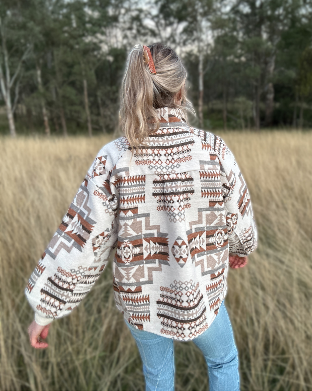 Something In The Orange Aztec Jumper